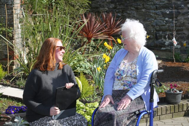 Grwp Cynefin tenant sharing their opinions with Grwp Cynefin staff