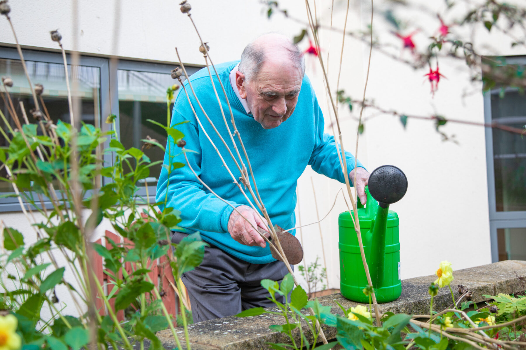One of the Llys Awelon residents gardening